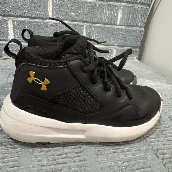 Size 13C Under Armour Kids' Black and Gold Sneakers - Picture 1 of 7
